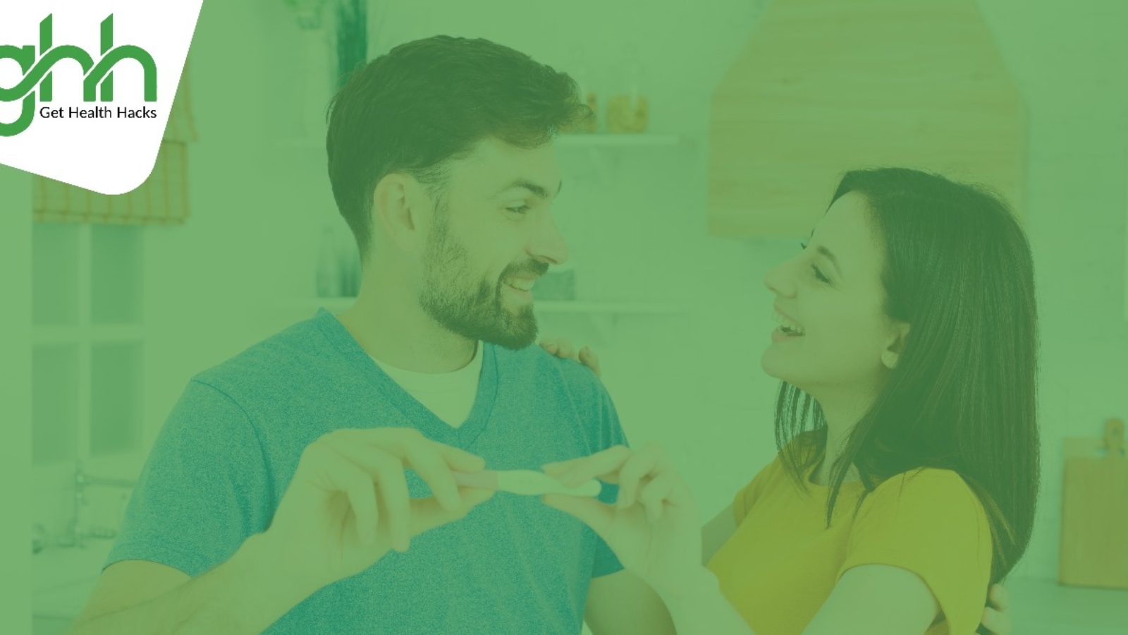 A man and a woman with happy faces after seeing a postive pregnancy text due to taking antioxidants for male fertility