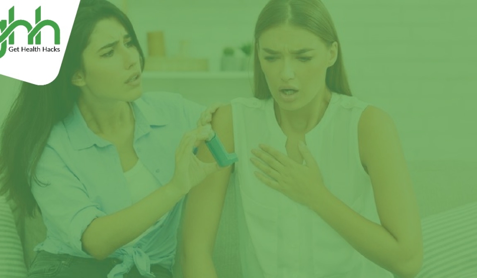 A Women feeling discomfort in the chest and other is providing her an inhaler.