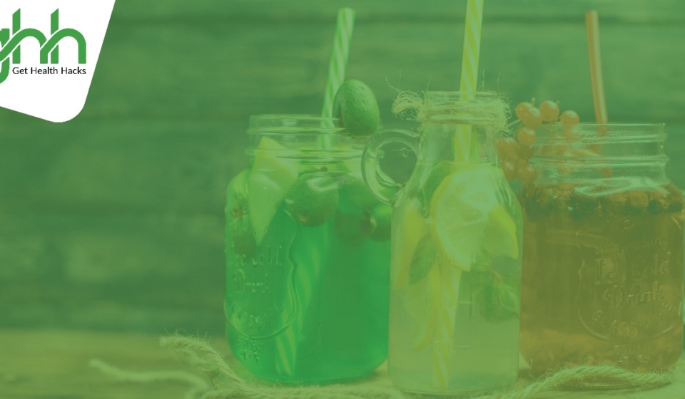 The image is showing natural drinks for immune health in jars lying on a table with a clear background